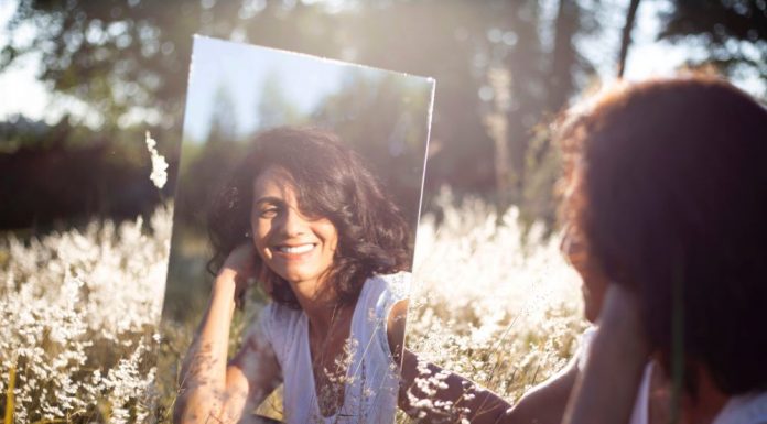How the Word “I” Changes Brain-Self Relativity
